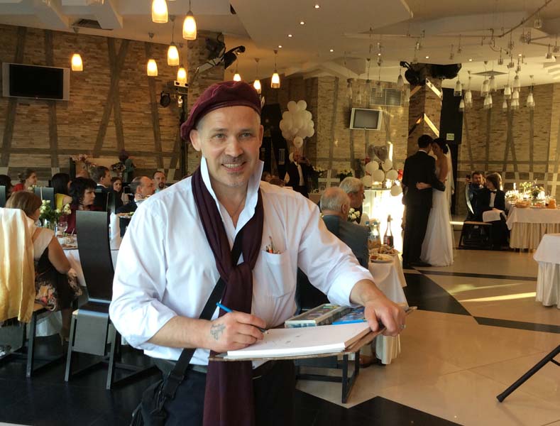 шаржист на свадьбе Михаил Шабалин рисует в Виктории шарж по фото